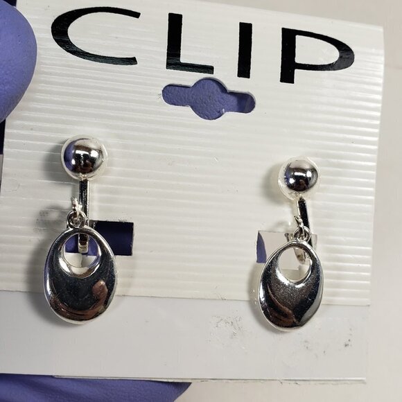Women's Stunning Polished Silver tone Oval Hoop Clip-on Drop Earrings, 1-inch - Picture 7 of 7